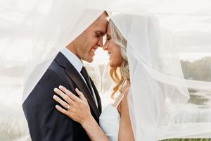 Bride and groom veil photo