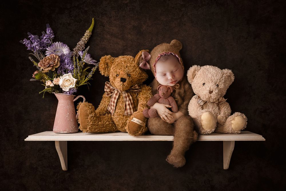 fotografa de bebes en ponce ositos en un tablillero y flores detres photography