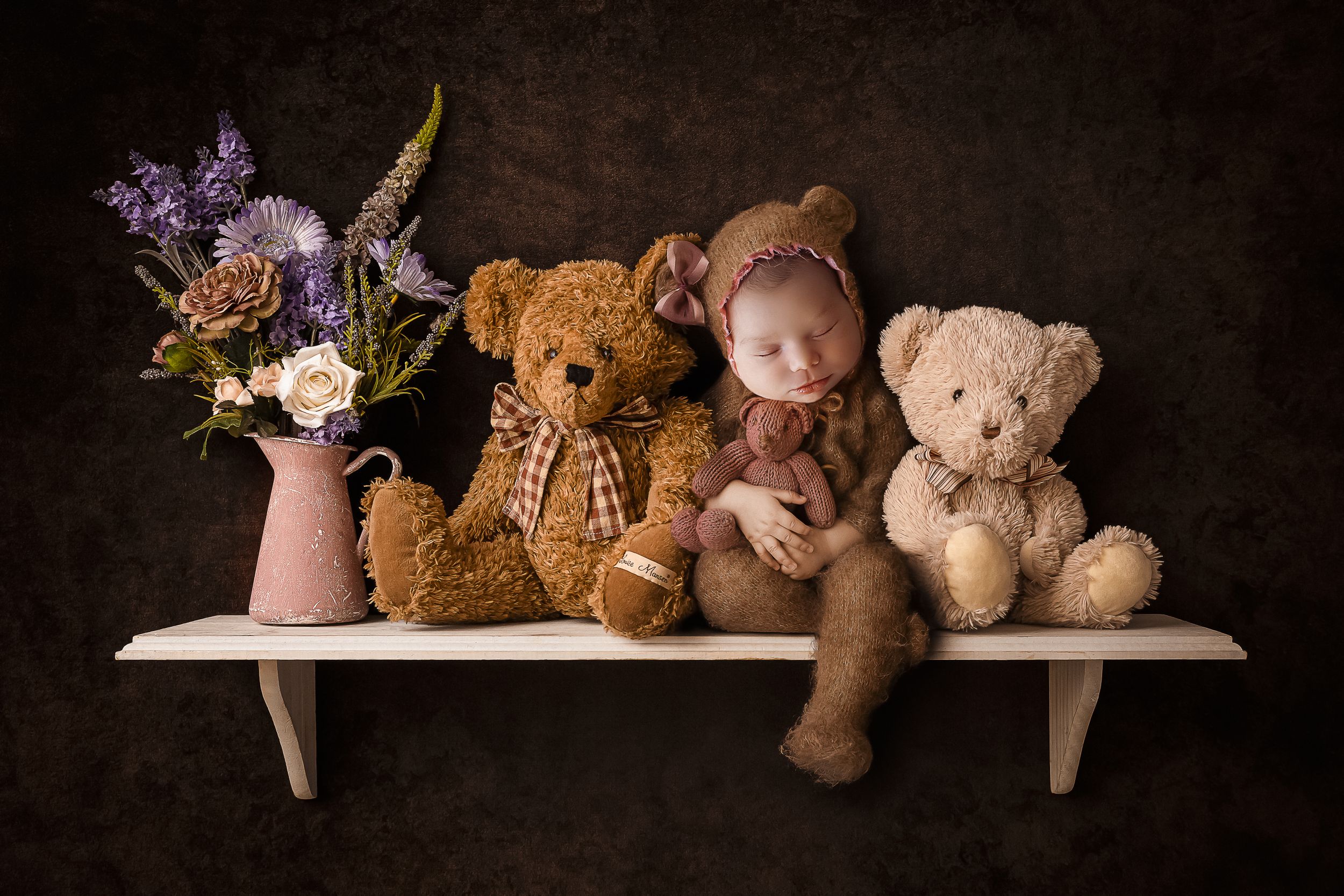 fotografa de bebes en ponce ositos en un tablillero y flores detres photography