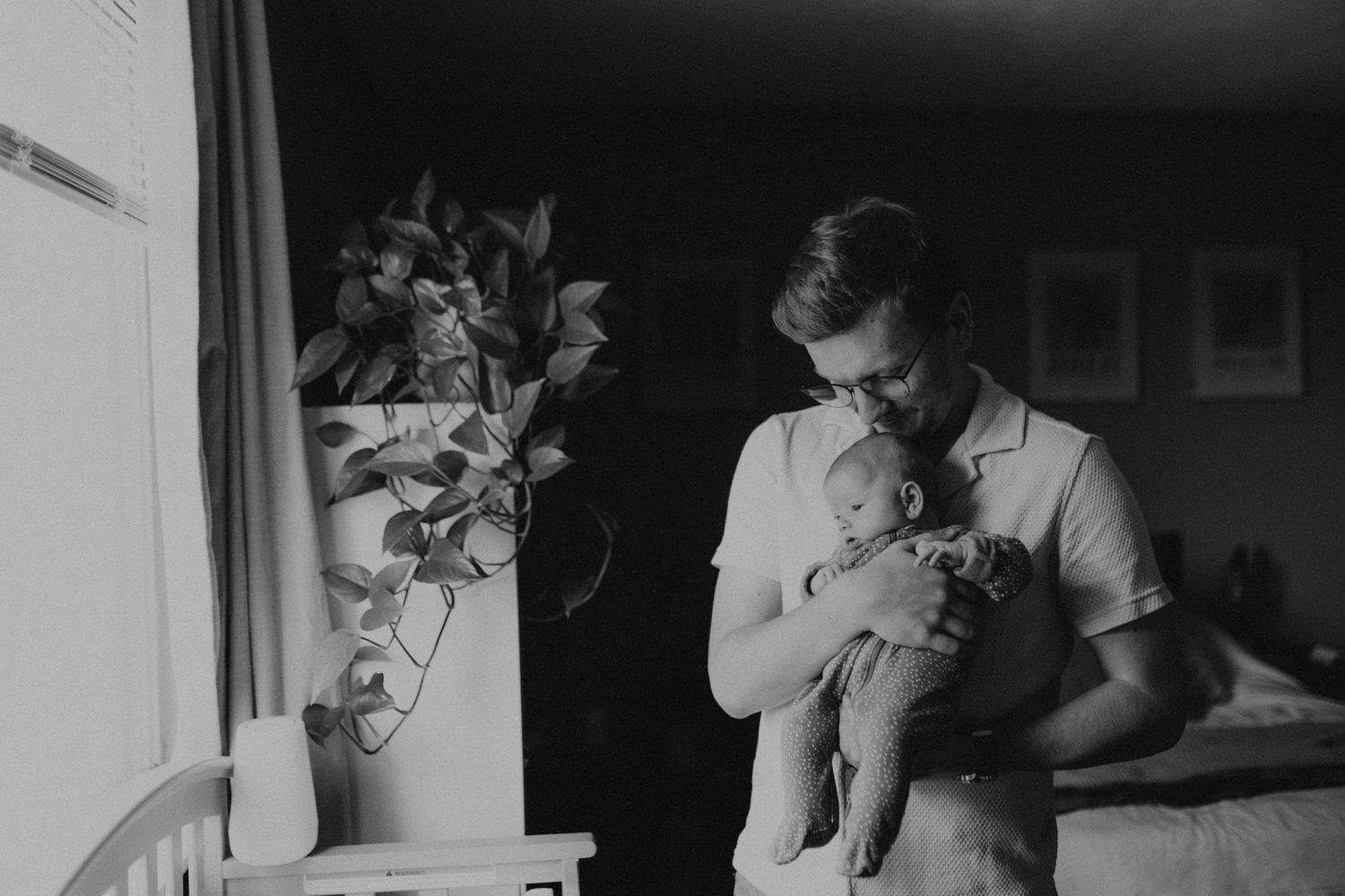 A black and white photo collage shows tender moments between a person and their pet cat in different settings.
