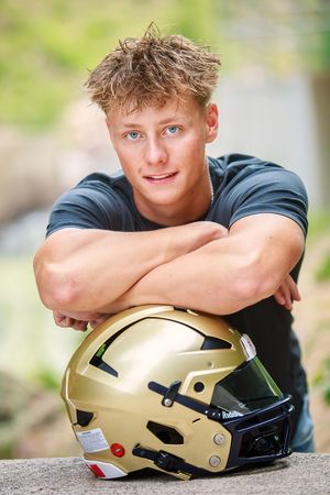 A series of photos showing someone resting their head on a gold and black football helmet outdoors.