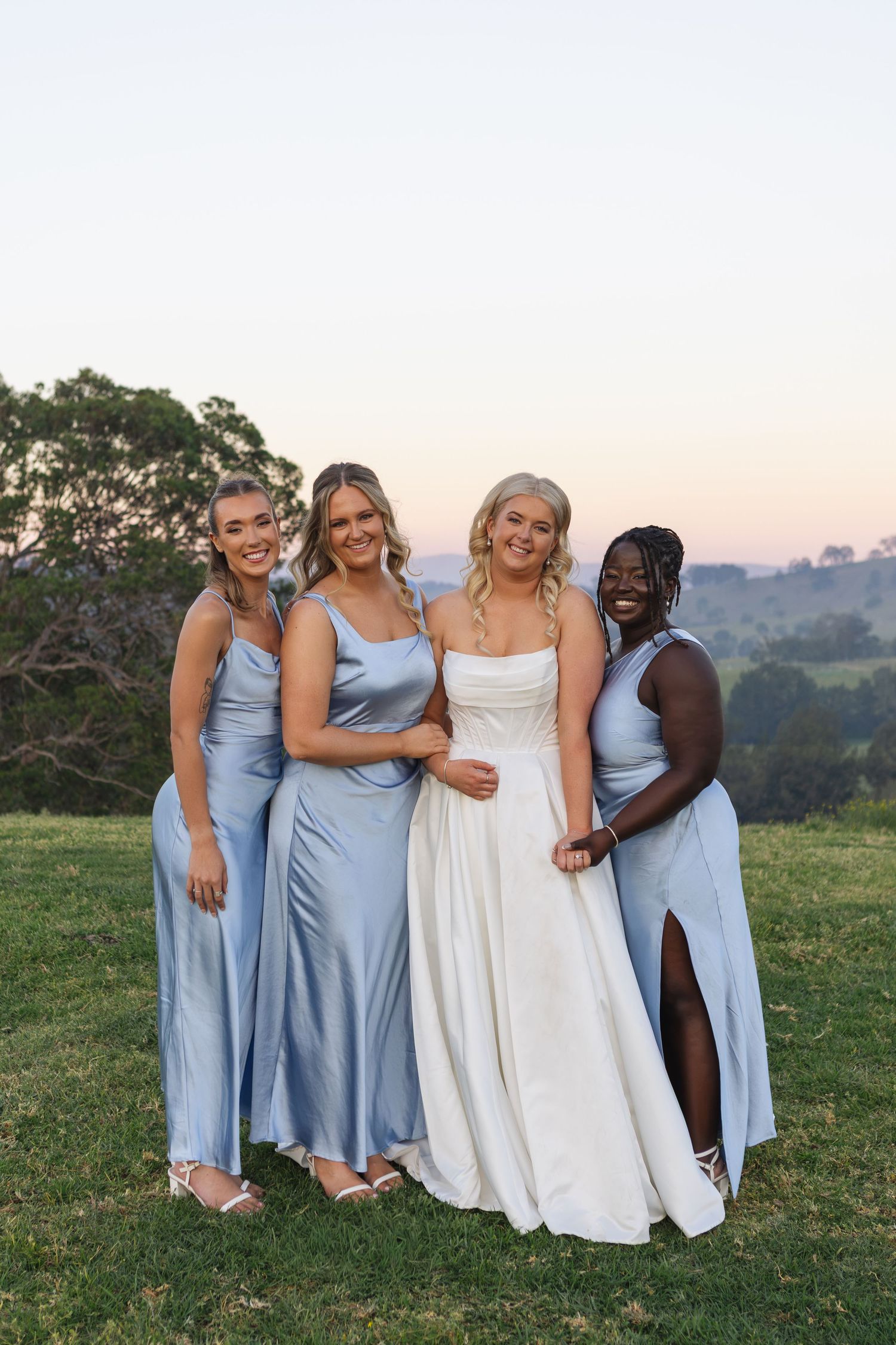 Jess and bridesmaids enjoying sunset wedding portraits at Dungog Weddings in the Hunter Valley NSW