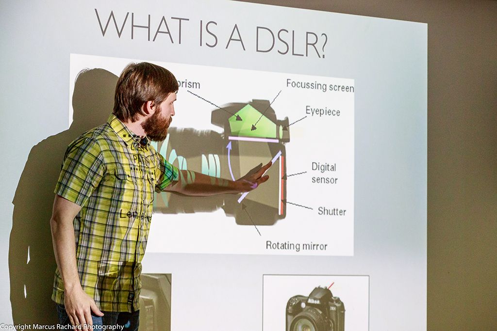 Arkansas nature photographer and educator, Alex Kent teaching about digital photography with a DSLR projected on screen
