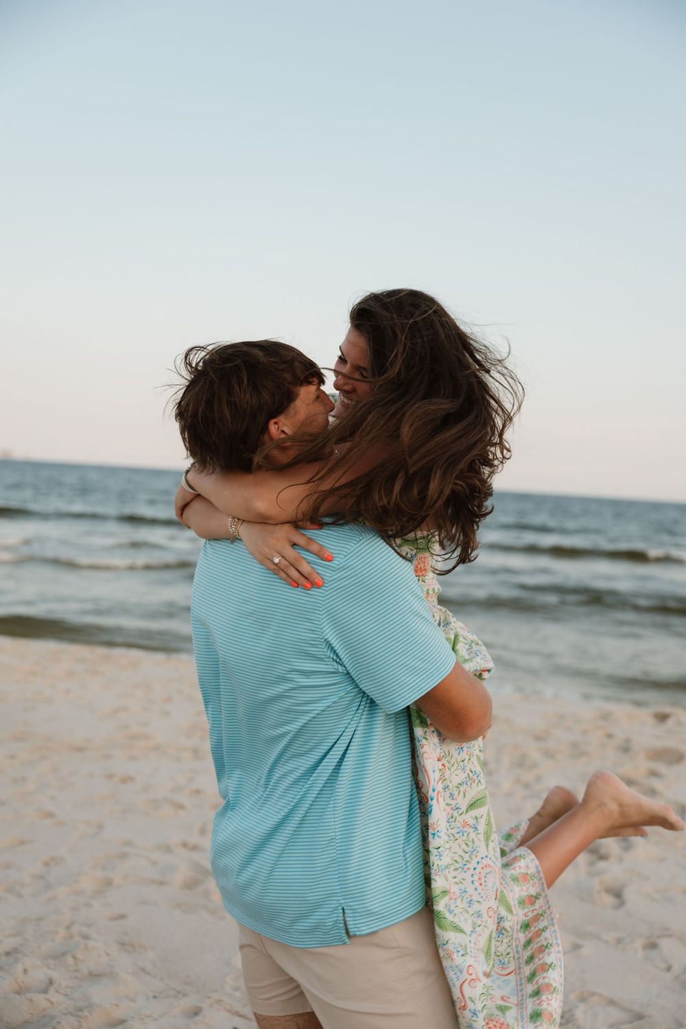 Couple photo session in the sand on the beach in Gulf shores and Orange beach.