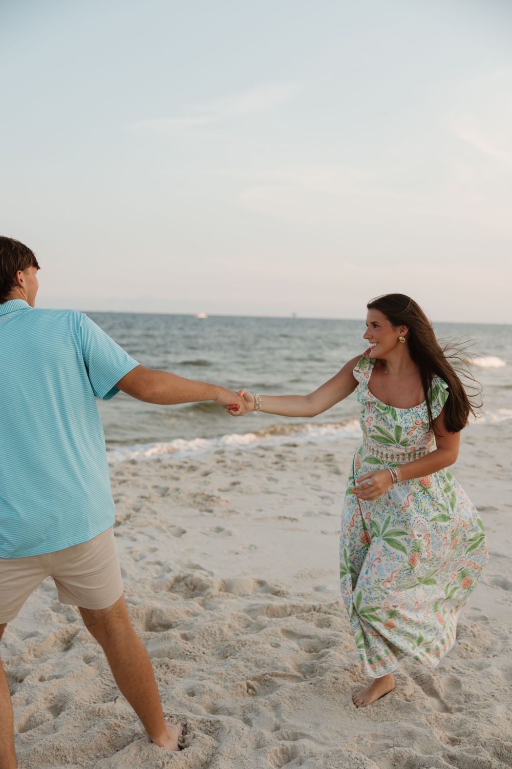 Couple photo session in the sand on the beach in Gulf shores and Orange beach.