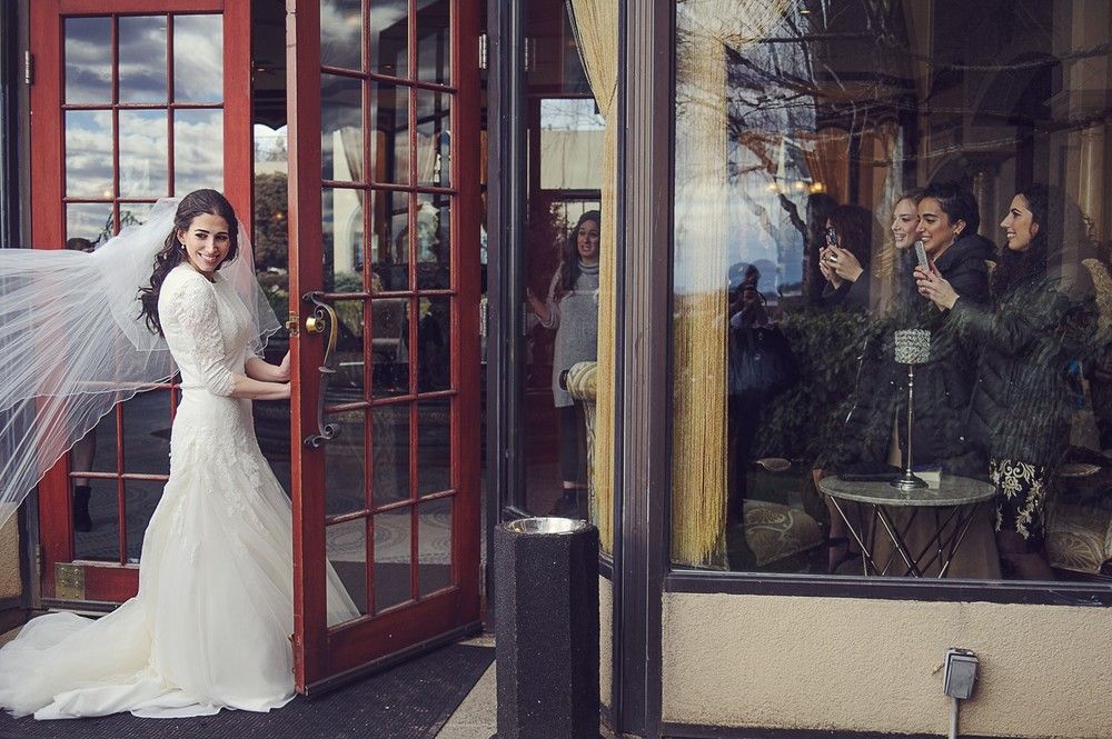 Urban wedding photography with reflections captured by Houston wedding photographer