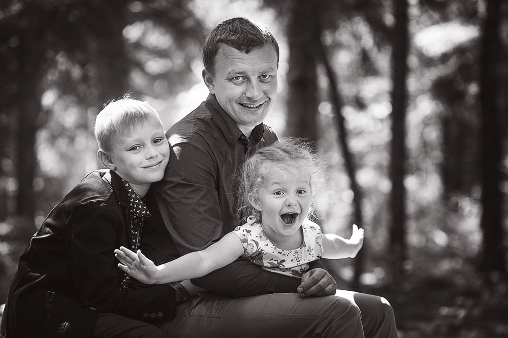 Emotional fatherhood portrait with children captured by Houston family photographer