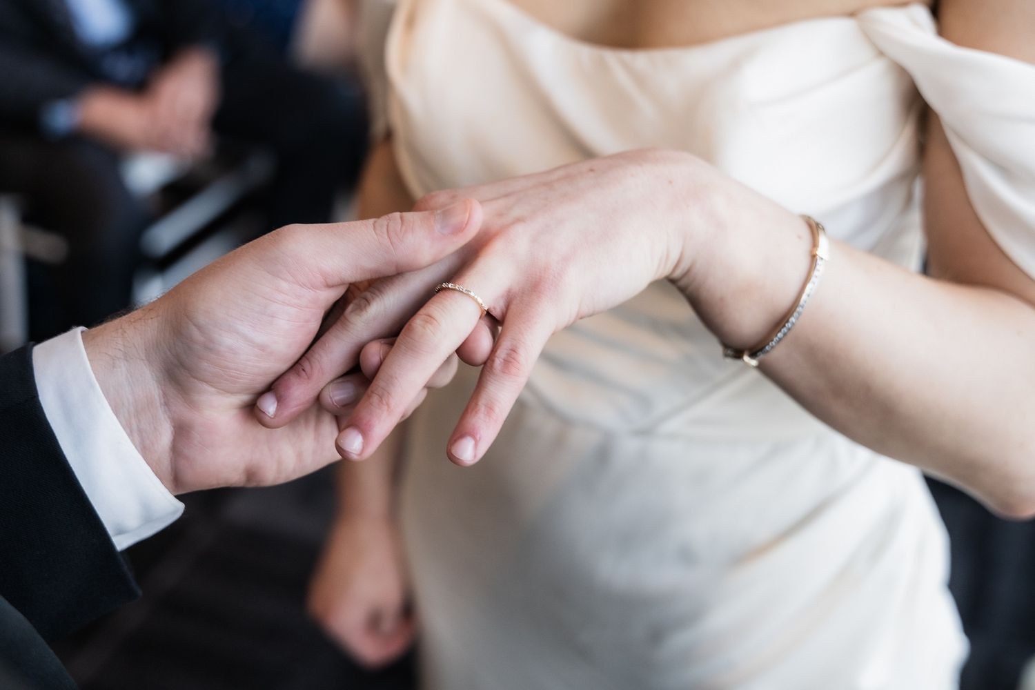 when he placed the wedding ring on her finger.
