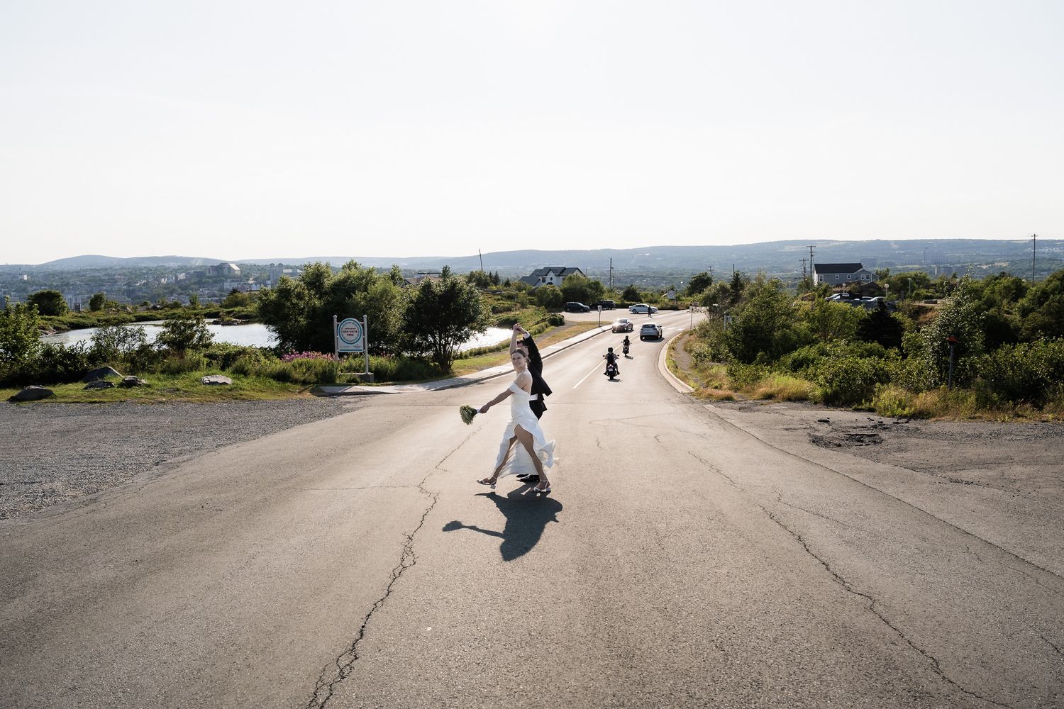 crossing the road at the sunset.