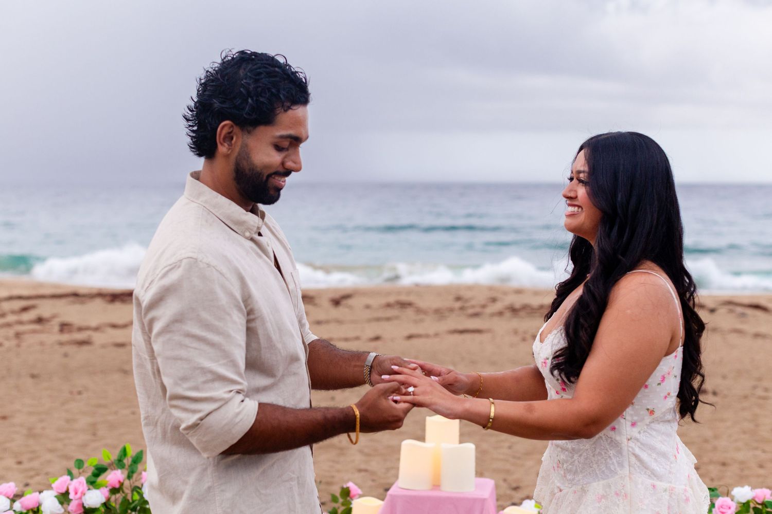Marriage proposal on the beach with flowers and candles. Playa Guajataca, Isabela, Puerto Rico.
