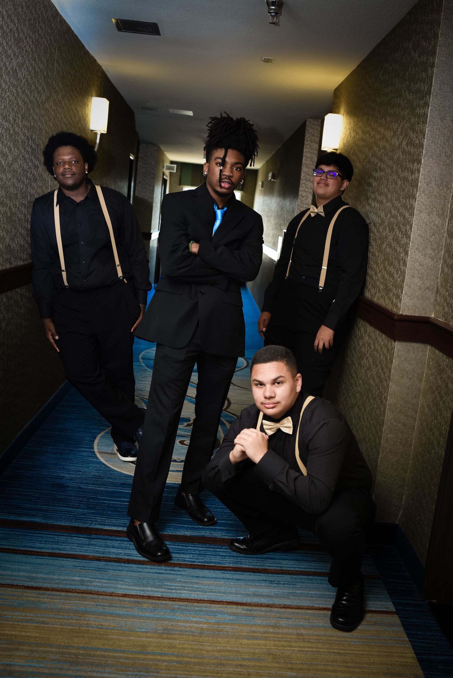 DFW Quinceañero photoshoot ideas combine tailored suits, luxury locations and confident poses for boys celebrating a milestone at age 15