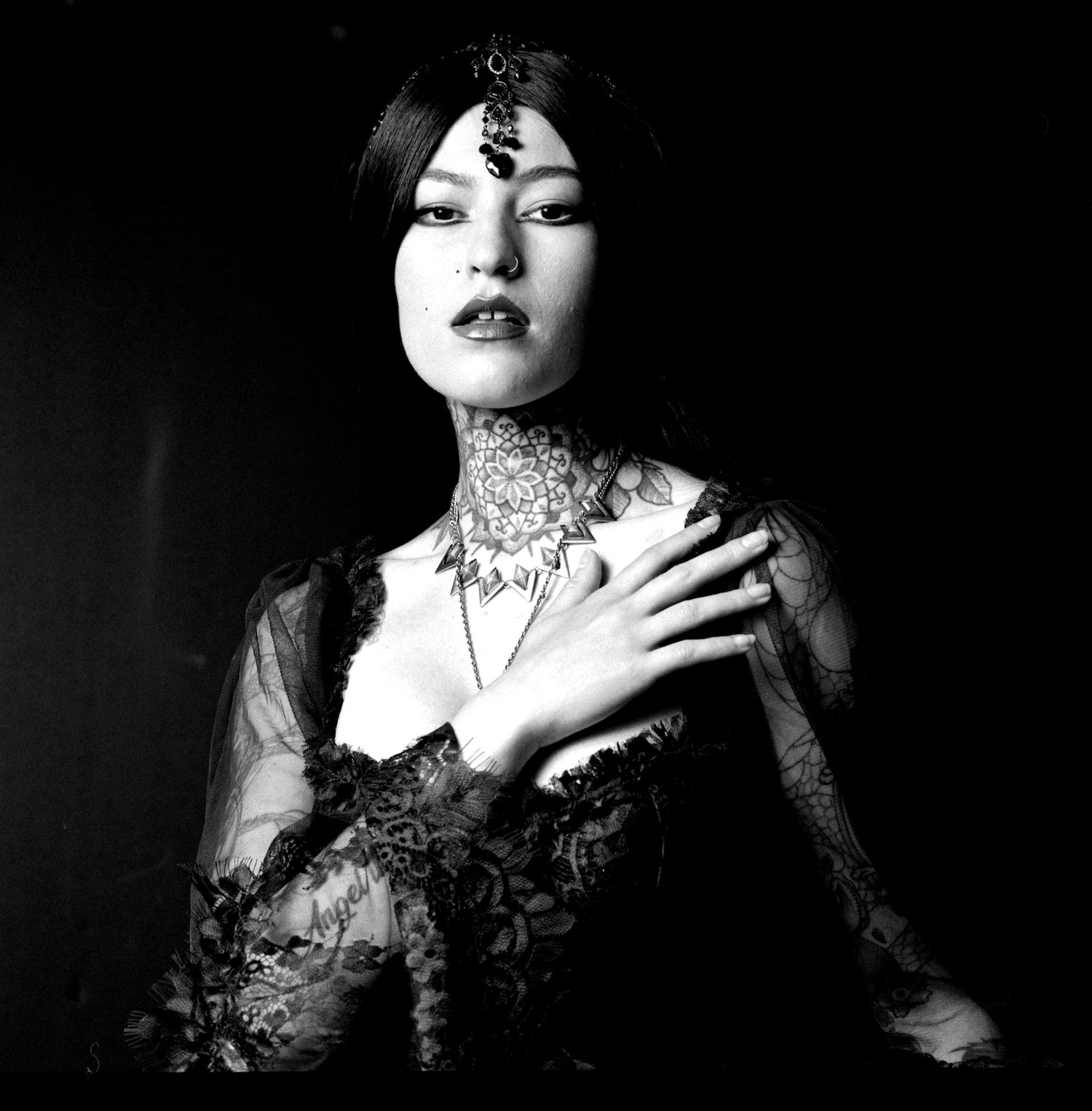 Anna Maria Georgia wearing head piece by Heather Shaw