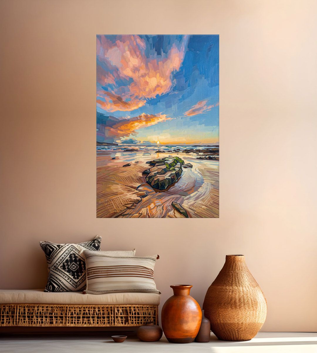 Vibrant sunset beach painting with dramatic orange clouds over rocky shoreline, displayed on a warm beige wall.
