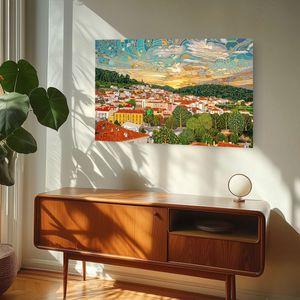 Mosaic-style wall art of a colorful European cityscape at sunset, displayed above a mid-century modern wooden sideboard.