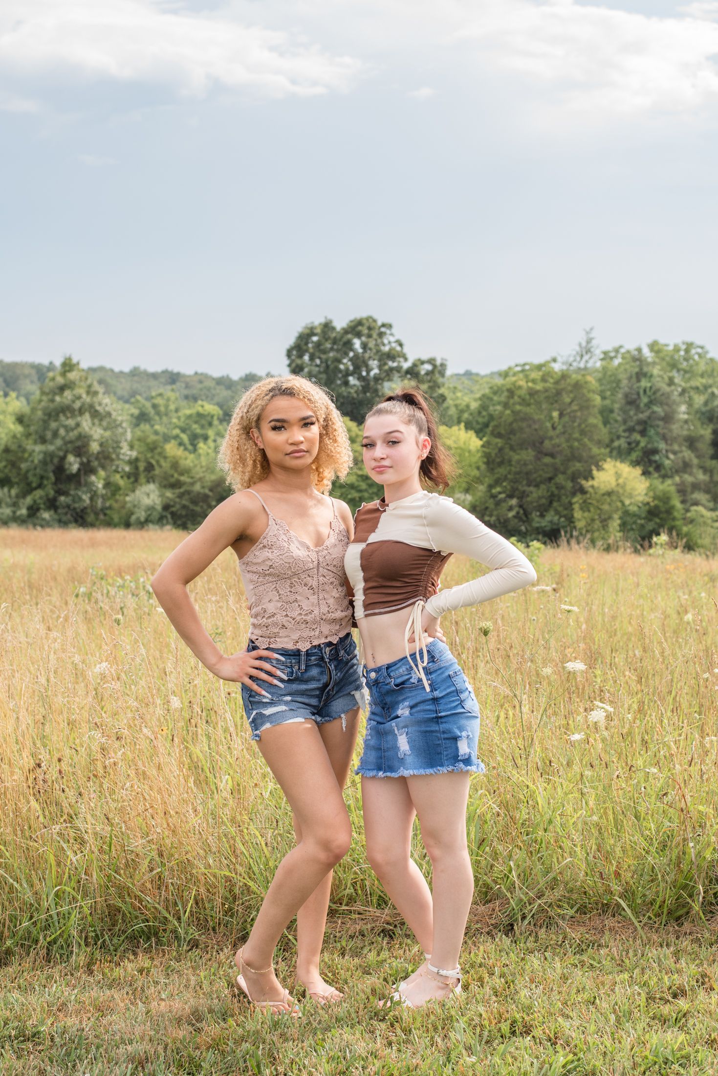 teen siblings standing close and posing during a candid fall family photo session in Northern Virginia