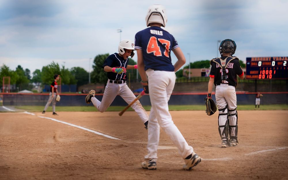 Hershey 12U batter follows through at the plate in Summer Slam baseball, by Deanna Fox, SportsFox Photography based in Hershey PA
