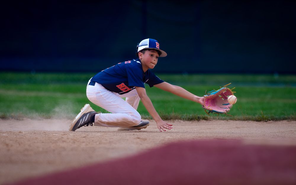 Hershey 12U infielder fields a grounder in the Summer Slam championship baseball, by Deanna Fox, SportsFox Photography based in Hershey PA