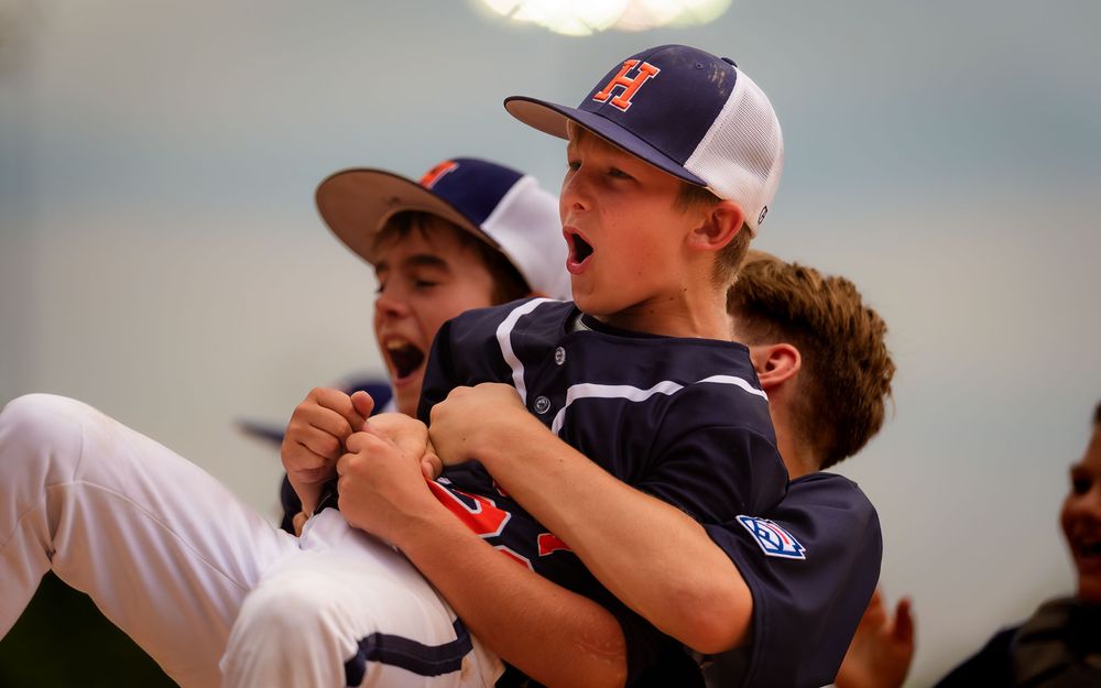 Hershey 12U players celebrate the Summer Slam championship baseball win, by Deanna Fox, SportsFox Photography based in Hershey PA