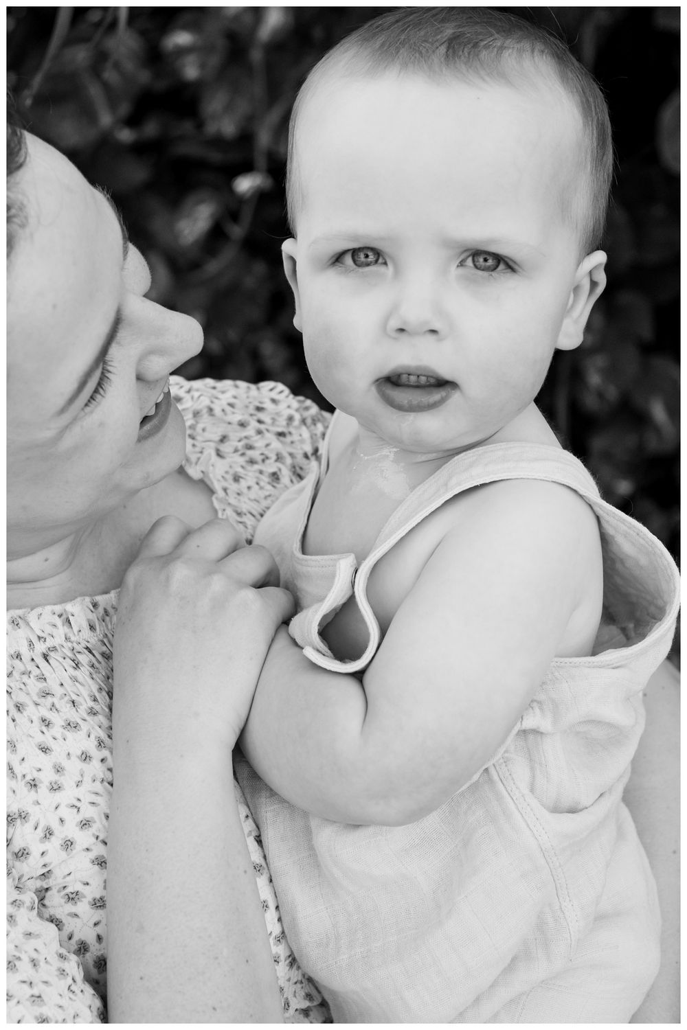Grand Velas Riviera Nayarit Family Photographer capturing a mother holding her baby during vacation family photos.