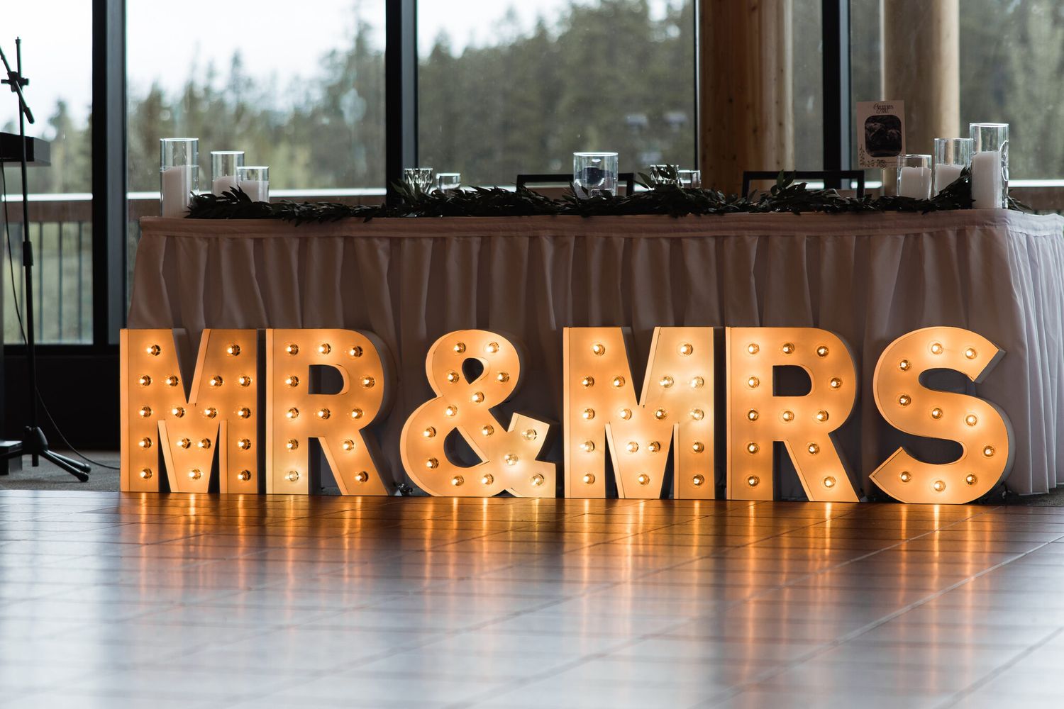 Glowing Mr and Mrs marquee letters at a Canmore wedding reception