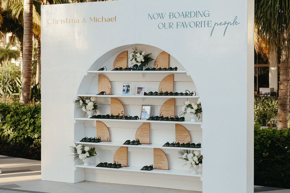 White arched seating chart display at an outdoor intimate wedding, Central NJ wedding photographer