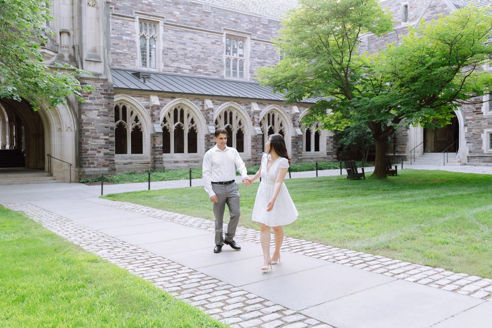 Couple walking hand in hand along a path at Princeton University, Central NJ couples photographer