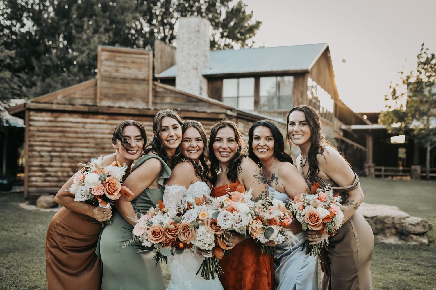 Rustic wedding party portraits in beautiful evening light