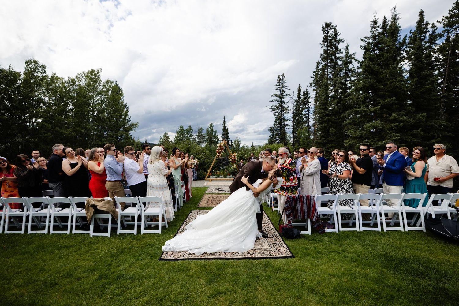Bride arriving at outdoor ceremony on the lawn at Azuridge