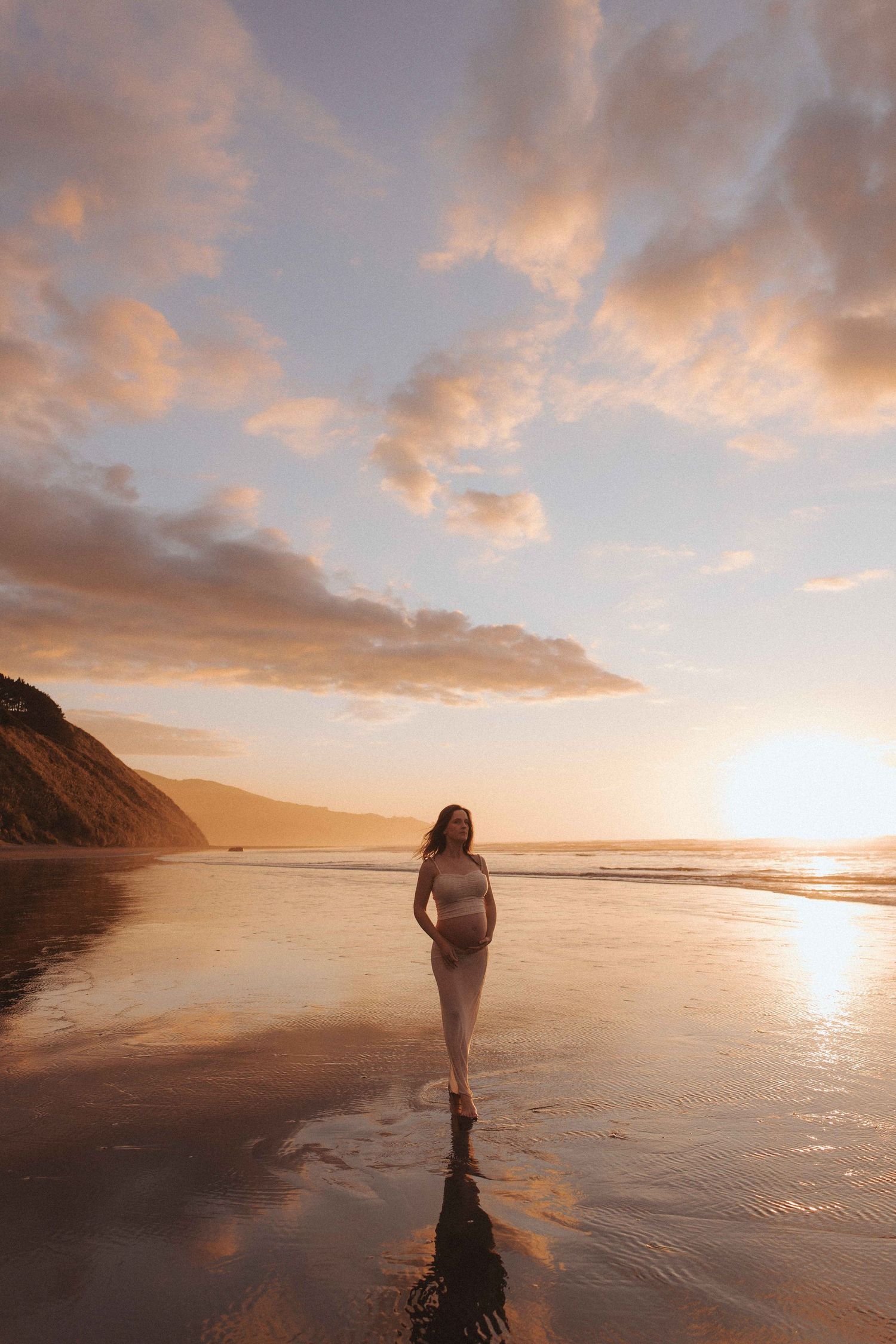 Pregnant woman at 35 weeks at her guided maternity session with Nami Creative in Raglan