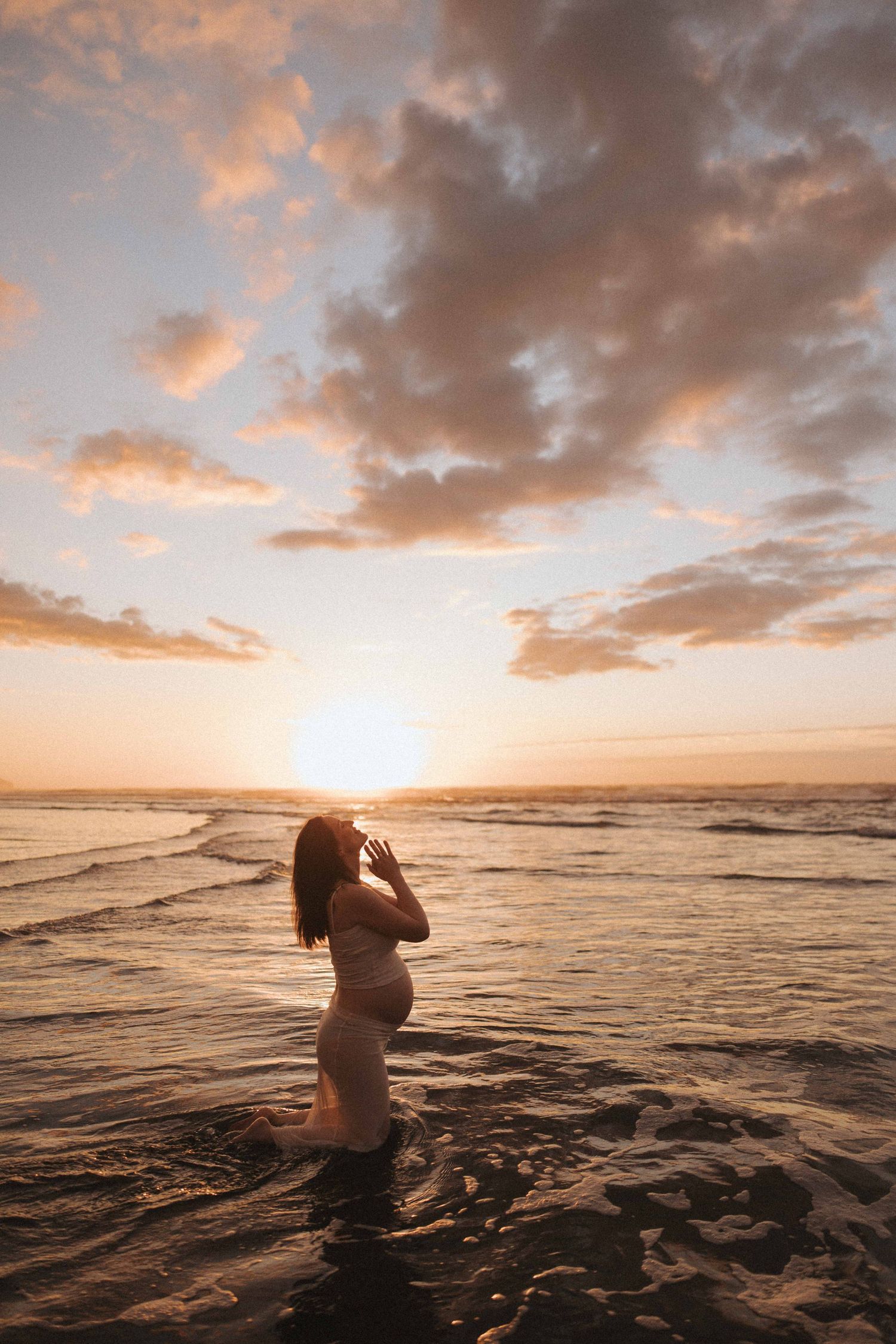 Pregnant woman at 35 weeks at her guided maternity session with Nami Creative in Raglan