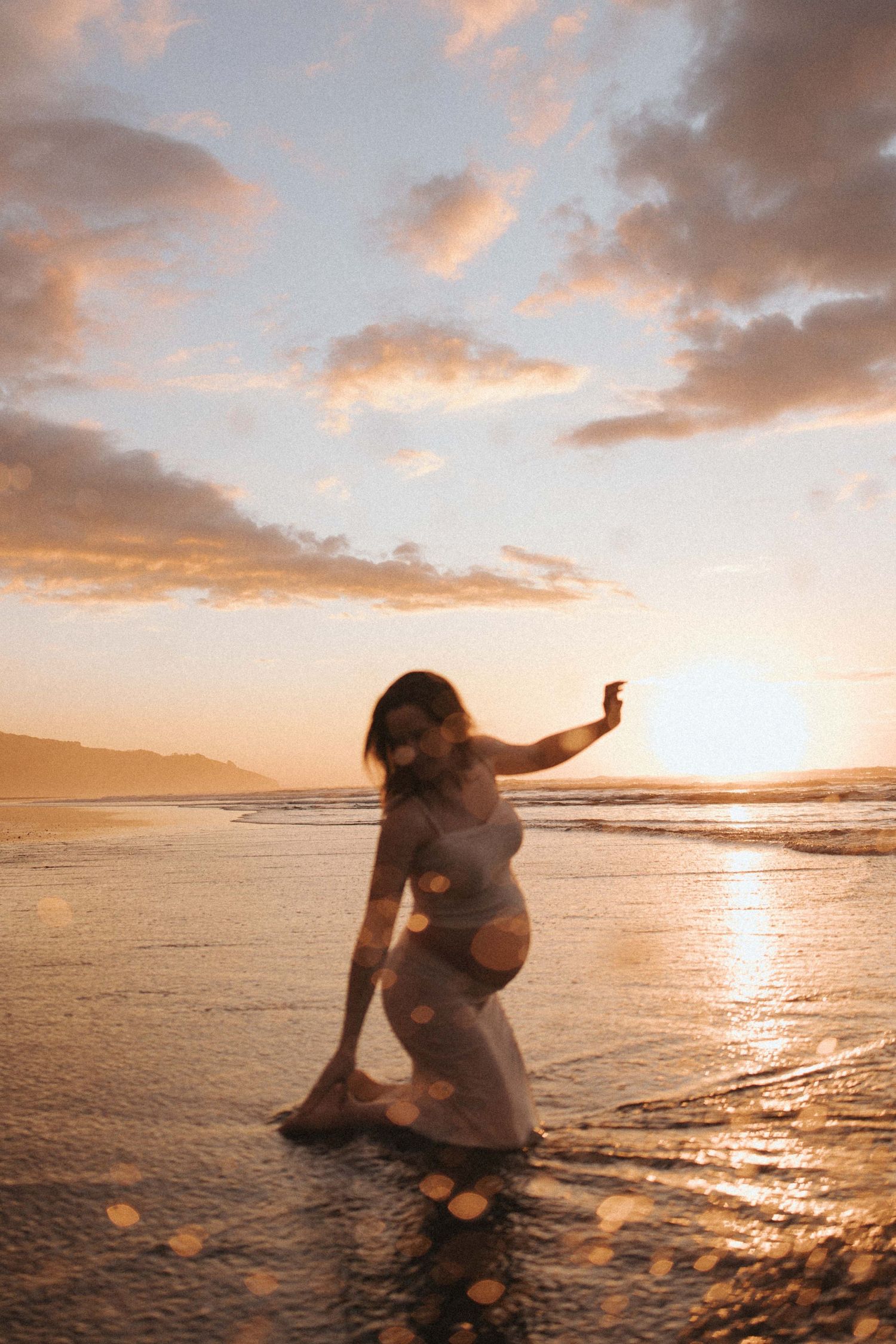 Maternity portrait of a photographer from Rotorua taken in Raglan, New Zealand by Nami Creative