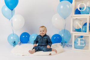 Adorable themed 1st birthday cake smash session in our Ridgefield, CT studio. Custom backdrops to celebrate your baby's big milestone!