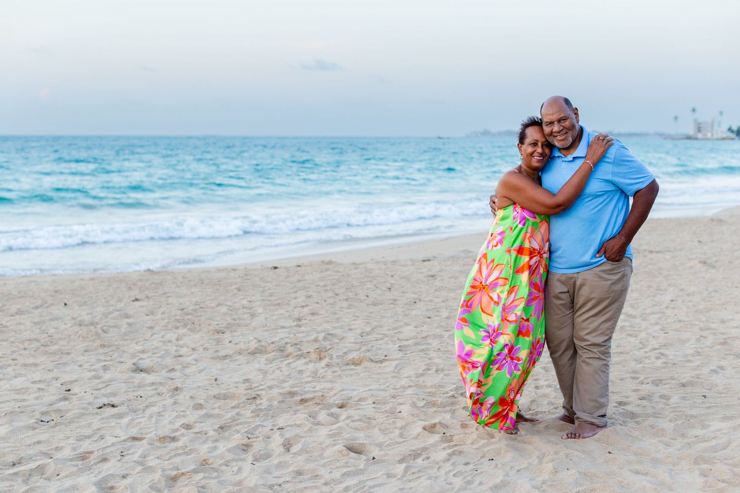 Couples portrait on the beach in Isla Verde, Carolina, Puerto Rico.