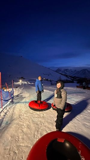 snow tubing at night