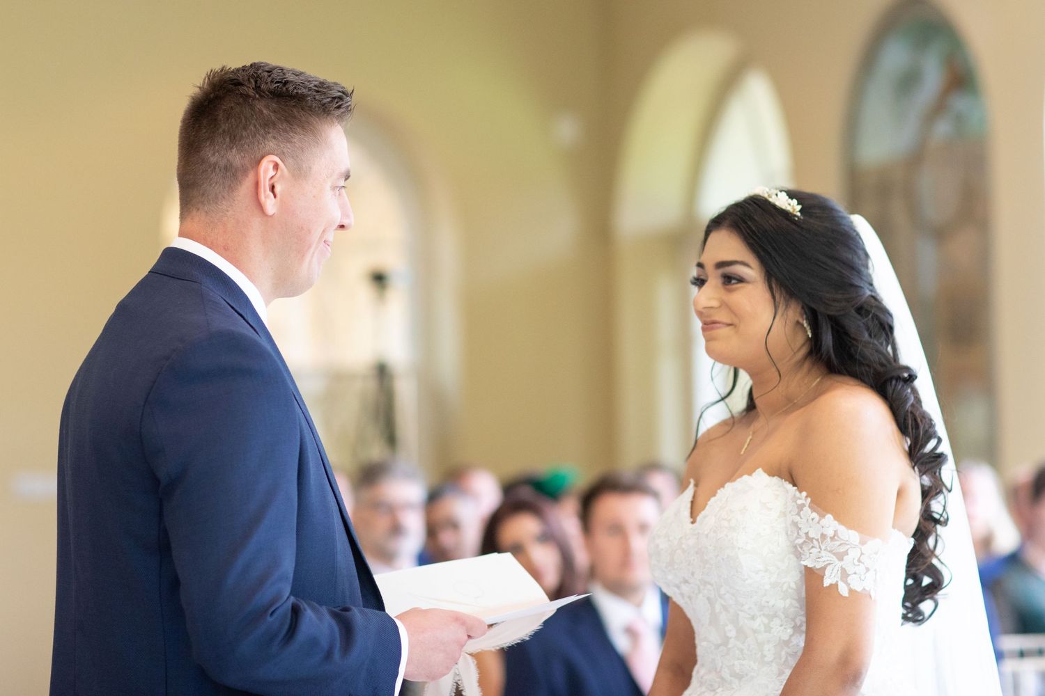 Bride and groom getting married at berated park