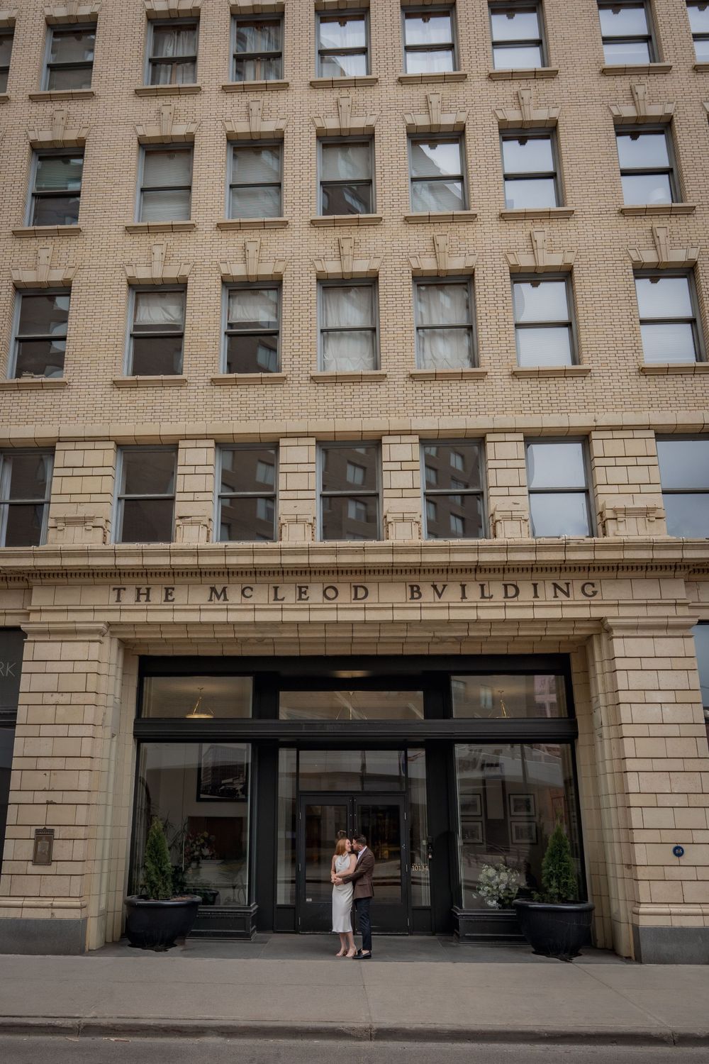 Historic McLeod Building facade with classic architectural details.