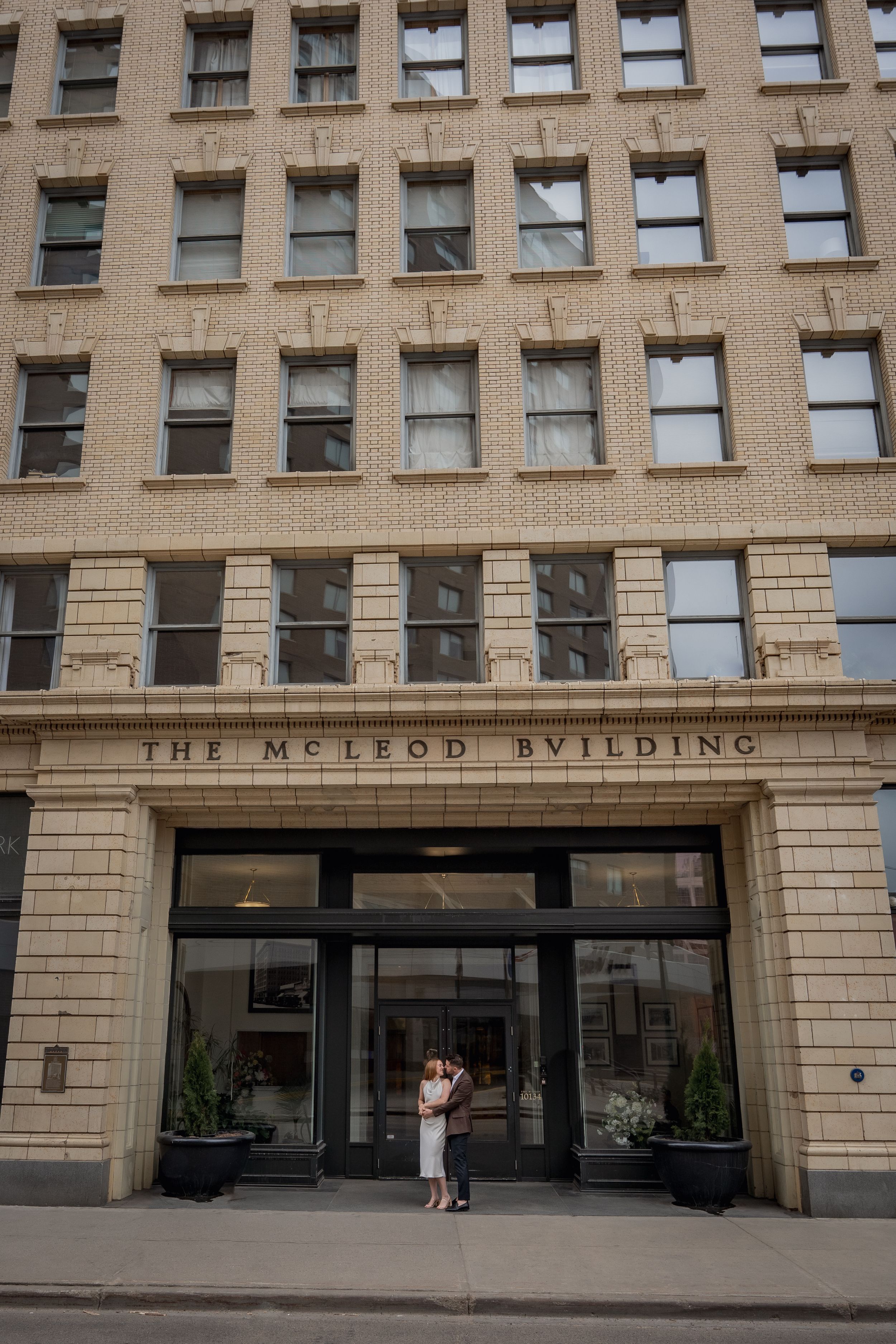 Historic McLeod Building facade with classic architectural details.
