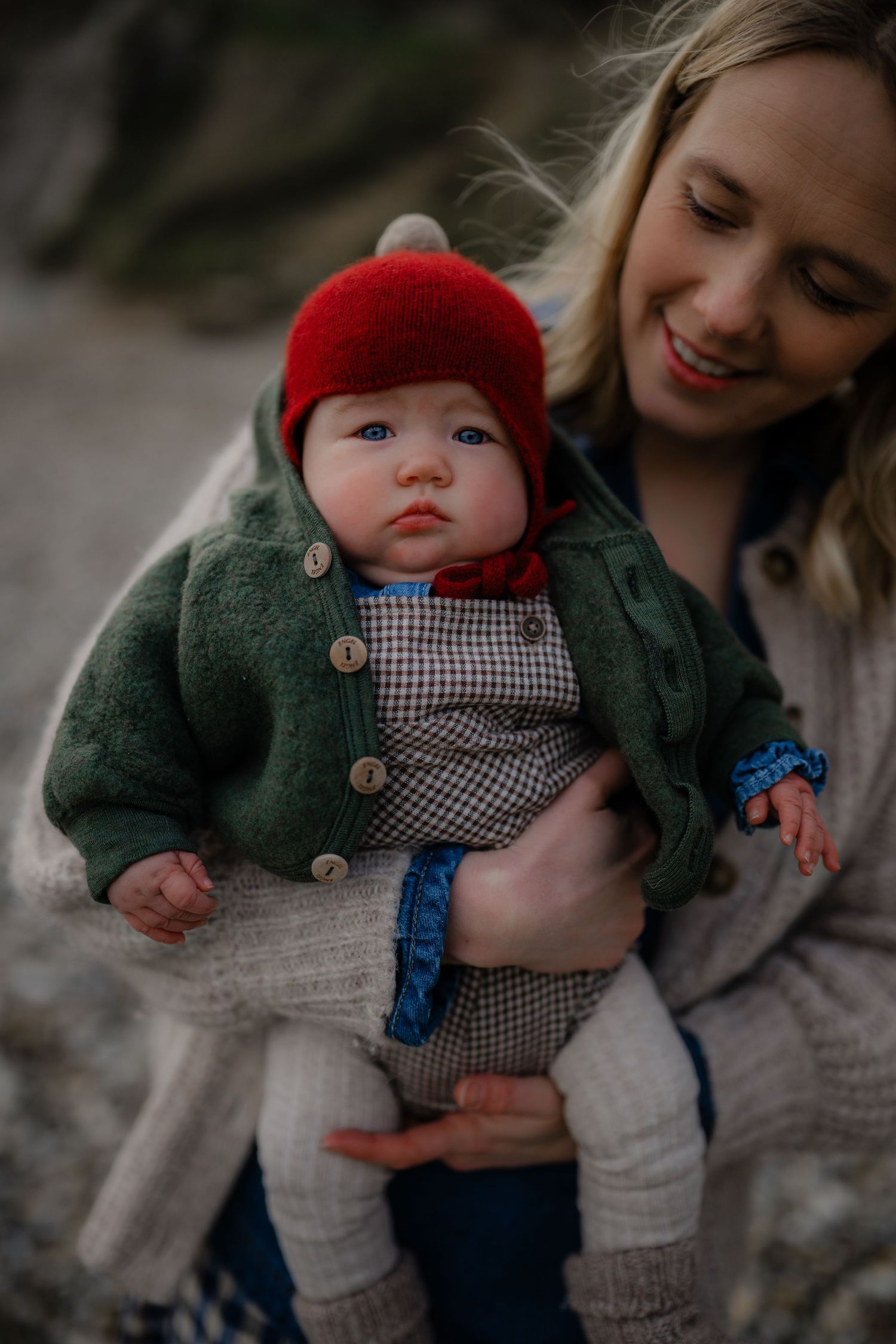 A mother holding her daughter during their photo session with Forever Ours Photography in Kent, UK