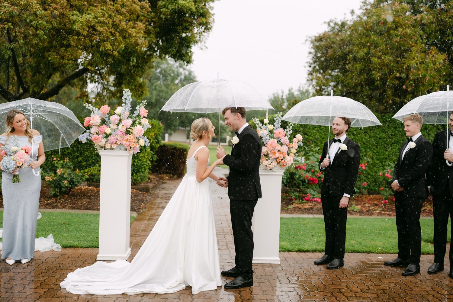 Sophie and Cameron Adelaide wedding at Cameron’s family home, sharing an intimate newlywed moment during their relaxed celebration