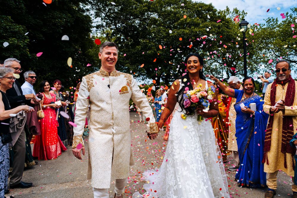 Confetti run with bride and groom in sefton park