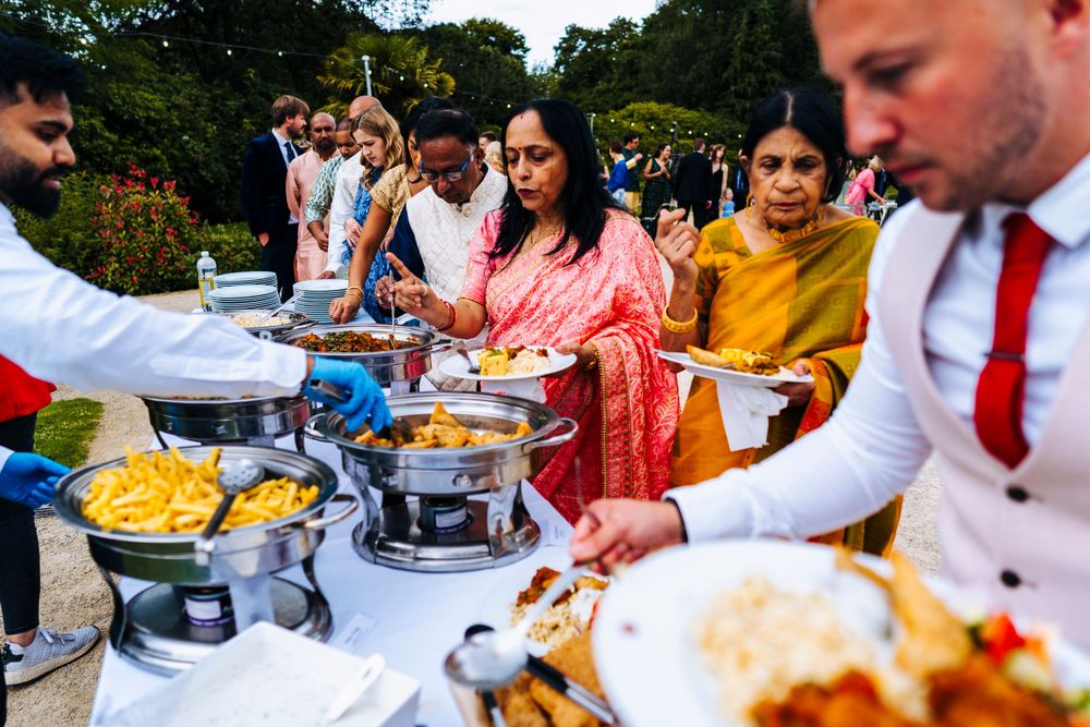 Indian wedding food in sefton park being served outside the palm house