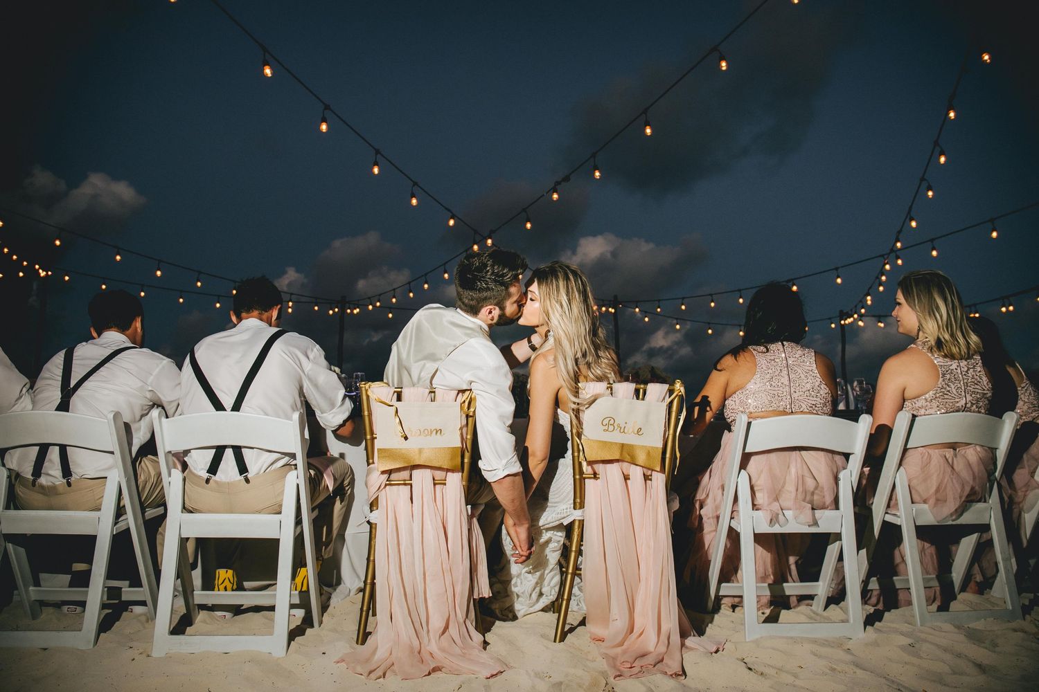kiss-weddingcouple-tiffanychairs-beachwedding-bluehour-rivieramaya-sandceremony-bridemaids-groomsmen