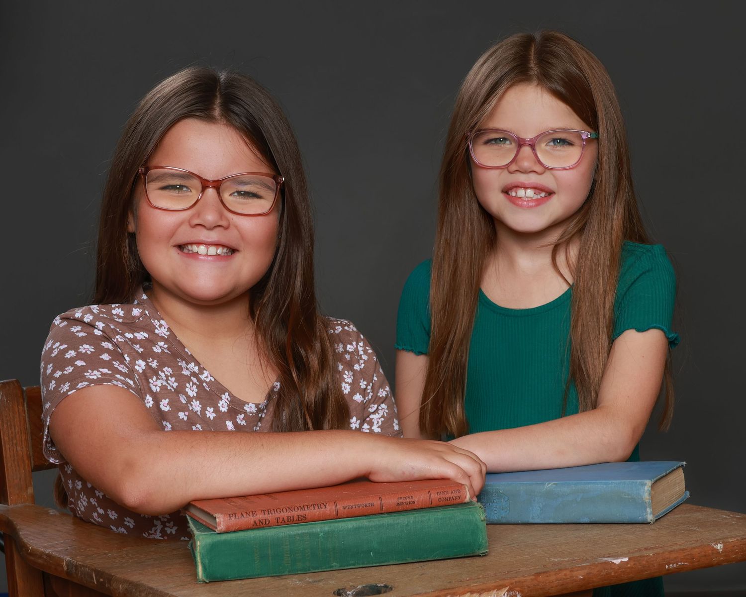 Children smiling naturally during school photo session in Miramichi studio