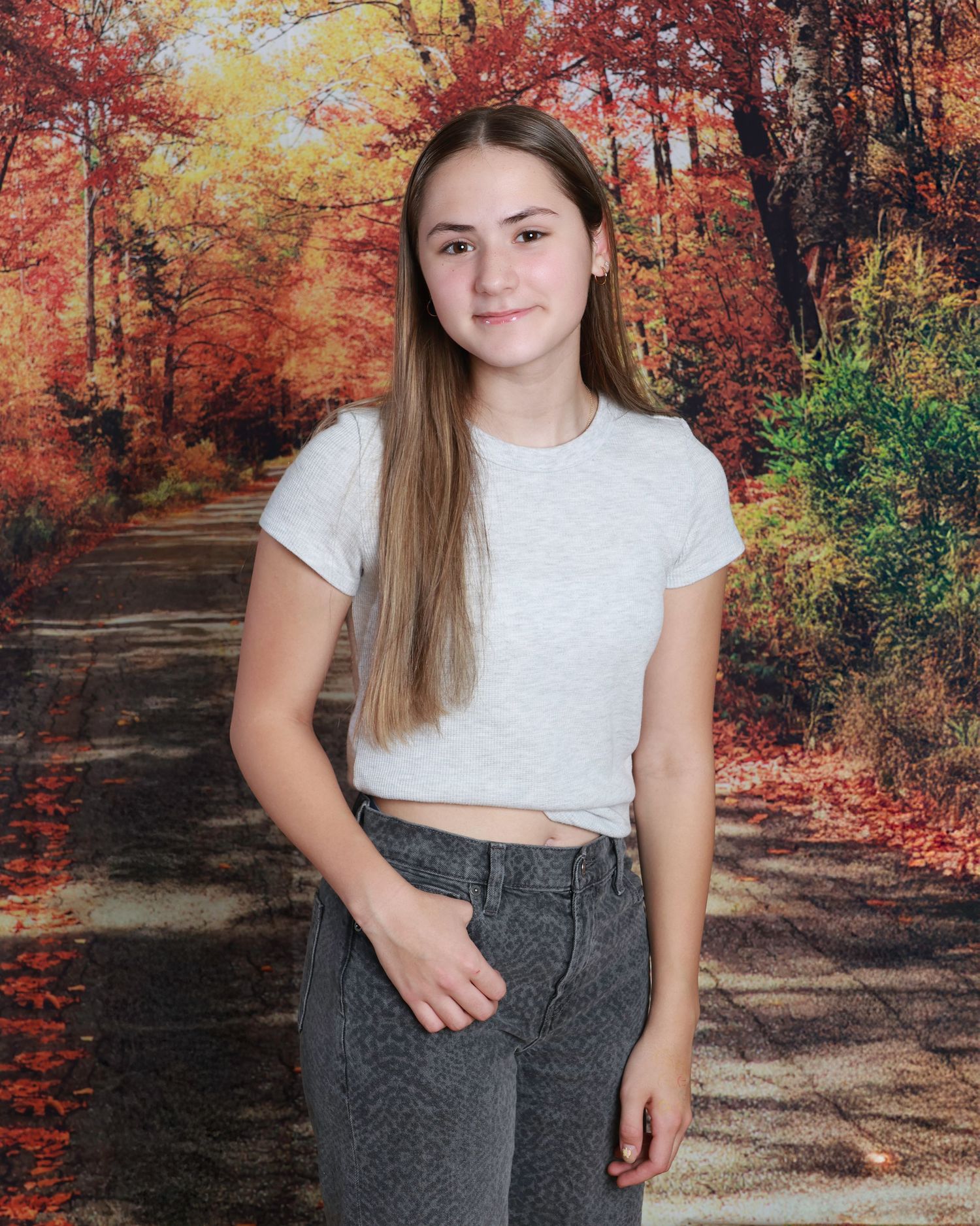 Children smiling naturally during school photo session in Miramichi studio