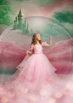 A magical fantasy scene with a flowing pink princess dress against a dreamy castle backdrop in soft misty colors.