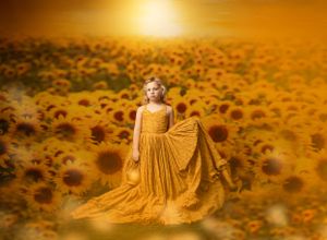 Golden dress flowing in sunflower field at sunset with warm lighting and dreamy atmosphere.