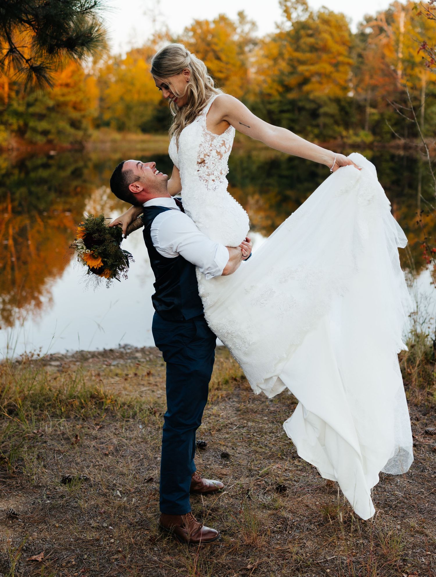 Newly married couple posing for natural lifestyle wedding portraits at Hidden Willows wedding venue in Cabot, Arkansas