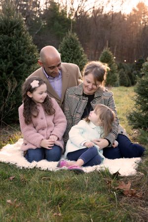 Family photo at Christmas Tree Farm, Deerfield Tree Farm in Millis Massachusetts