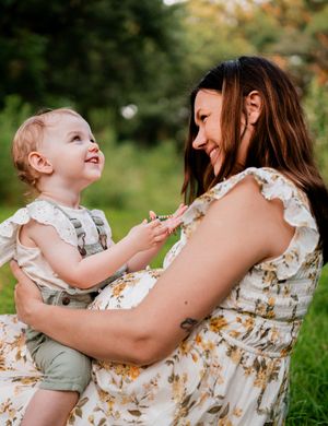 A series of candid outdoor photos showing tender moments between a parent and child in a natural setting.