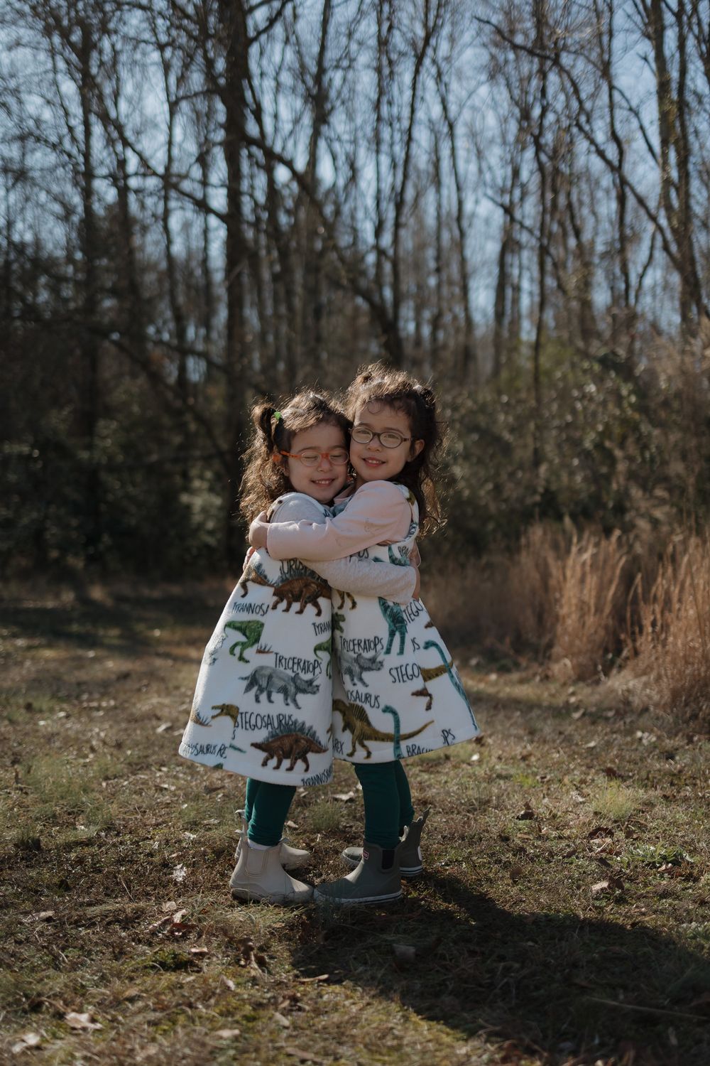 Toddler siblings hugging during fall photoshoot candid family portraits in Waxhaw, North Carolina and South Carolina
